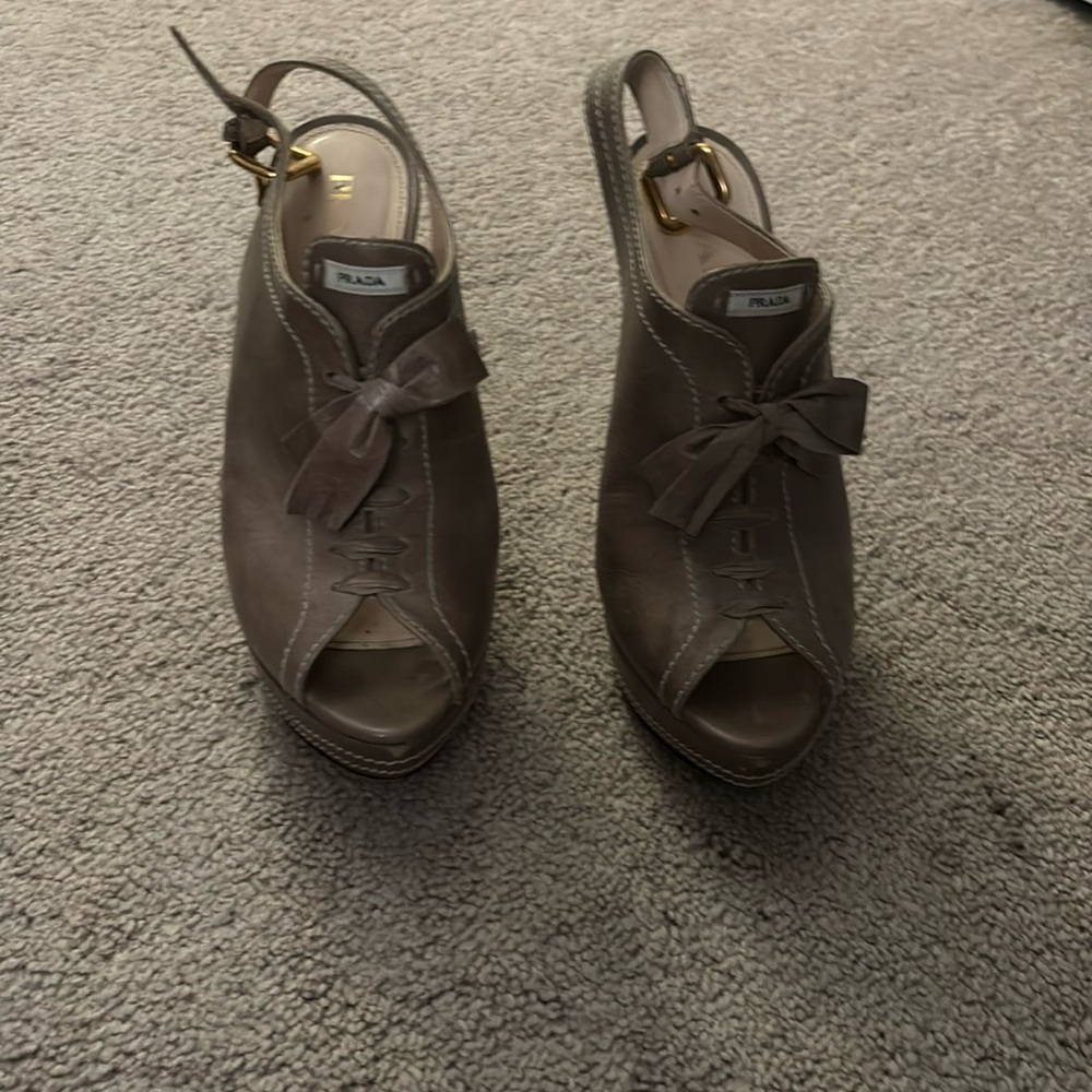 Prada booties - tan with white stitching and gold buckles
